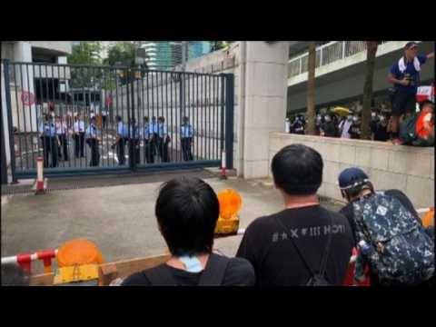 Hong Kong protesters gather near police station