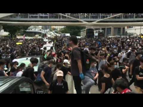 Hong Kong protesters block highway outside parliament