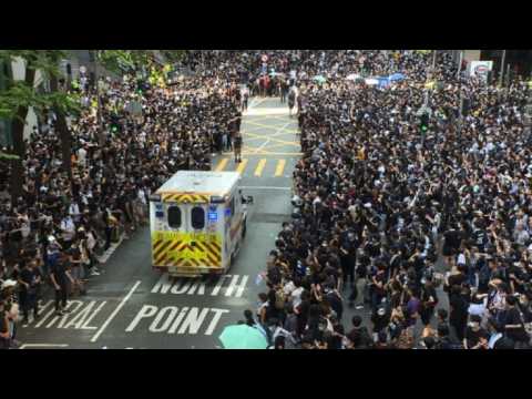 Hong Kong protesters give way to ambulance