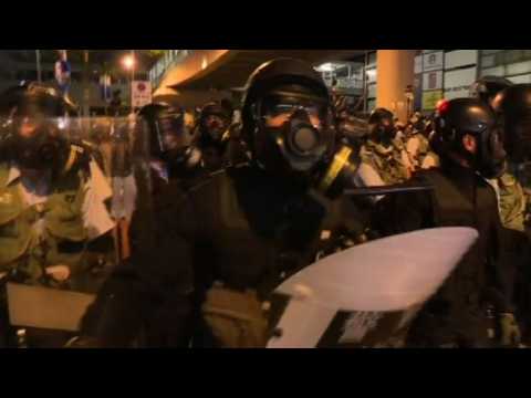Hong Kong riot police clear out protesters
