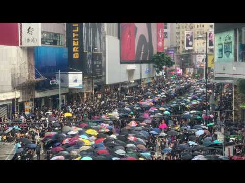 Hong Kong protesters gather at popular shopping district