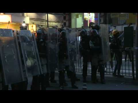 Hong Kong police clash with protesters near Beijing liaison office