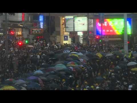 Crowds march at Hong Kong's popular shopping district