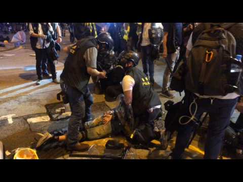 Police arrest Hong Kong protesters at clashes