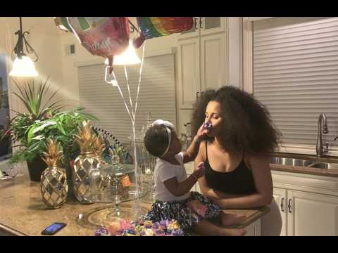 Kulture covers mom Cardi B in cake on first birthday