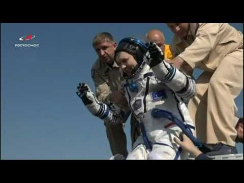 Russian, North American astronauts return to earth