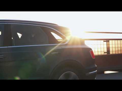 The new Bentley Bentayga Hybrid in Windsor Blue Driving Video