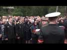 Russia lays to rest 14 officers killed in fire on nuclear-powered submarine