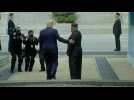Trump shakes hands with Kim and steps into North Korea