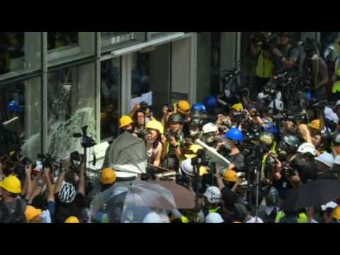 Protesters try to smash way into Hong Kong's parliament