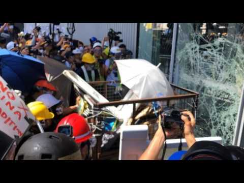 On the ground: HK protesters smash glass at parliament