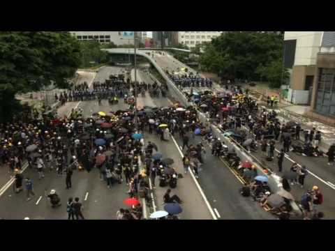 Protesters block major highway in Hong Kong