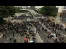 Protesters block major highway in Hong Kong