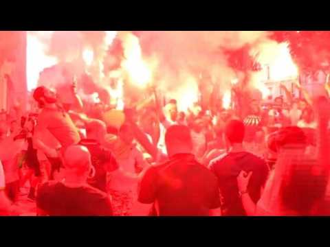 Fans celebrate Algeria's first goal in Marseille