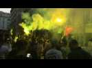 Algerian supporters celebrate in Paris during the AFCON final