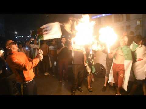 Algerians celebrate team's win at the Algiers' Post Office