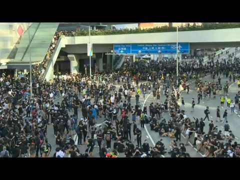 Hong Kong protesters retake main highway in latest march