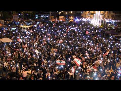Lebanese celebrate in the streets of Tripoli after PM's resignation