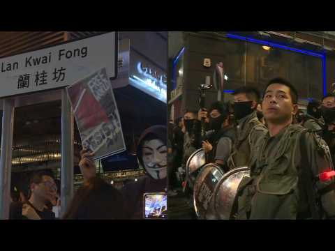 Police block Hong Kong party street as protesters don Halloween masks