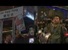 Police block Hong Kong party street as protesters don Halloween masks