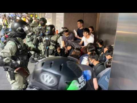 Police and protesters at HK's high-end Central district