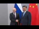 Presidents of Russia and China shake hands ahead of BRICS summit