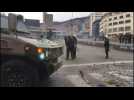 Bolivian police stand guard after violent clashes in La Paz