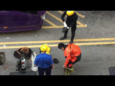 Divers descend Hong Kong sewers to rescue fleeing demonstrators