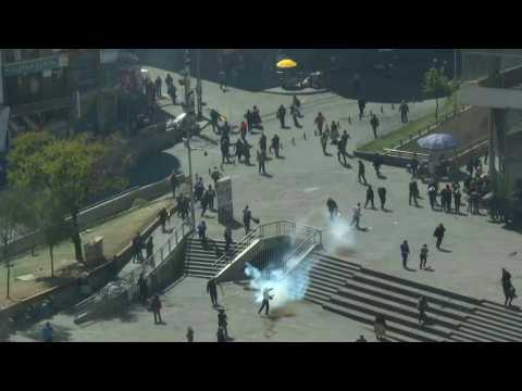 Police break up Bolivia funeral protest using tear gas
