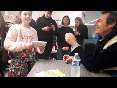 Les réactions à la séance de dédicaces de Jean-Luc Reichmann