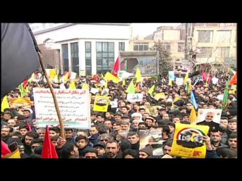 Iran: Mourners gather in Mashhad as top general's remains return