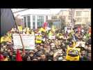 Iran: Mourners gather in Mashhad as top general's remains return