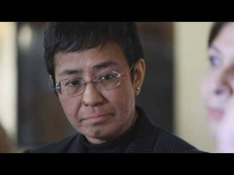 Duterte critic, journalist Maria Ressa attends trial on cyber-libel charges