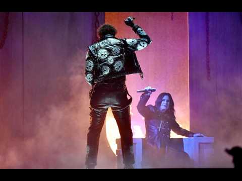 Ozzy Osbourne makes surprise performance on white throne at AMAs