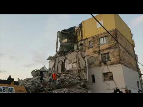 Debris of collapsed building is being cleared after 6.4 quake hits Albania