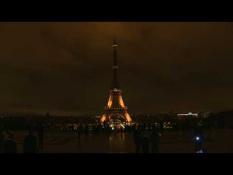 Eiffel Tower lights out to mark fight against abuse of women