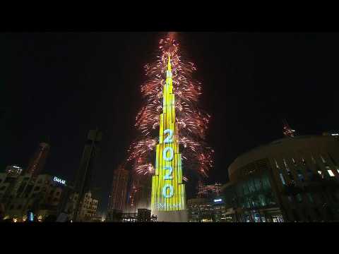 The clock strikes midnight in Dubai, ushers in the new year