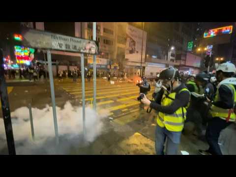 Police fire tear gas as Hong Kong rings in New Year