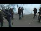 Police and rioters clash in Paris during demonstration against pension reform