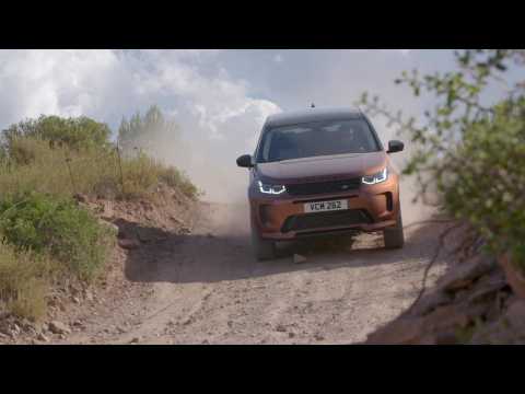 New Land Rover Discovery Sport in Namib Orange Off-Road Driving