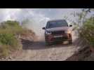 New Land Rover Discovery Sport in Namib Orange Off-Road Driving
