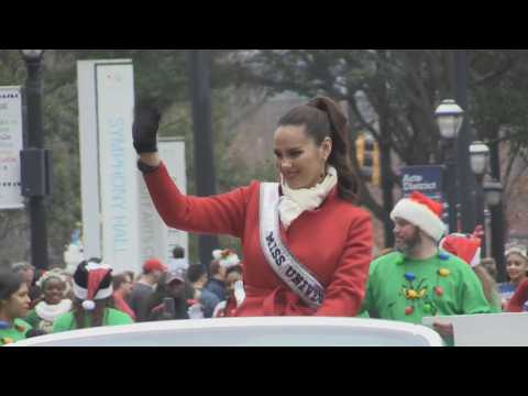 Miss Universe says goodbye with a Christmas parade in Atlanta