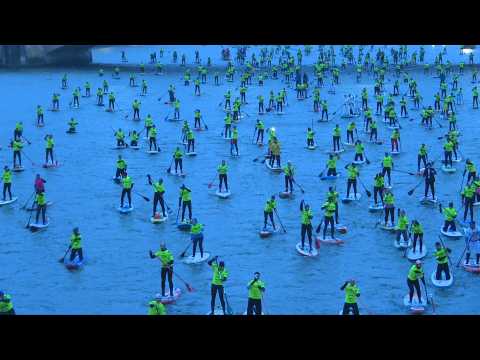 Paddle boarders invade the Seine in Paris