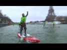 Hundreds of paddle boarders take part in Paris race