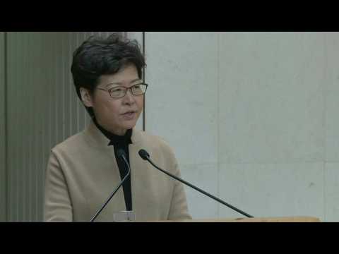 Hong Kong leader says campus protesters must surrender