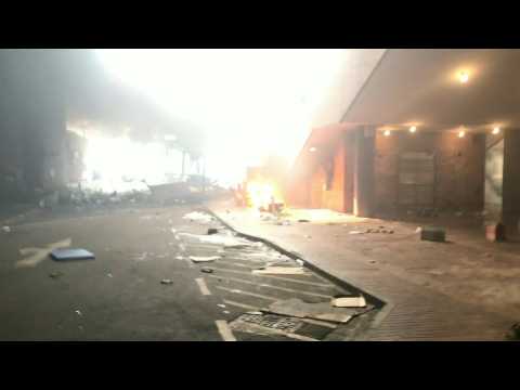 Protesters set fire to hold off police at Hong Kong campus
