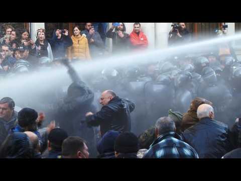 Georgia: riot police use water cannons to disperse protesters