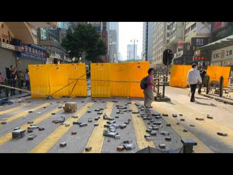 Hong Kong protesters create barricades, place bricks in Kowloon