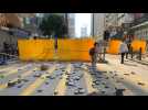 Hong Kong protesters create barricades, place bricks in Kowloon