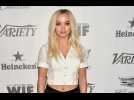 Dove Cameron getting tattoo for her late father